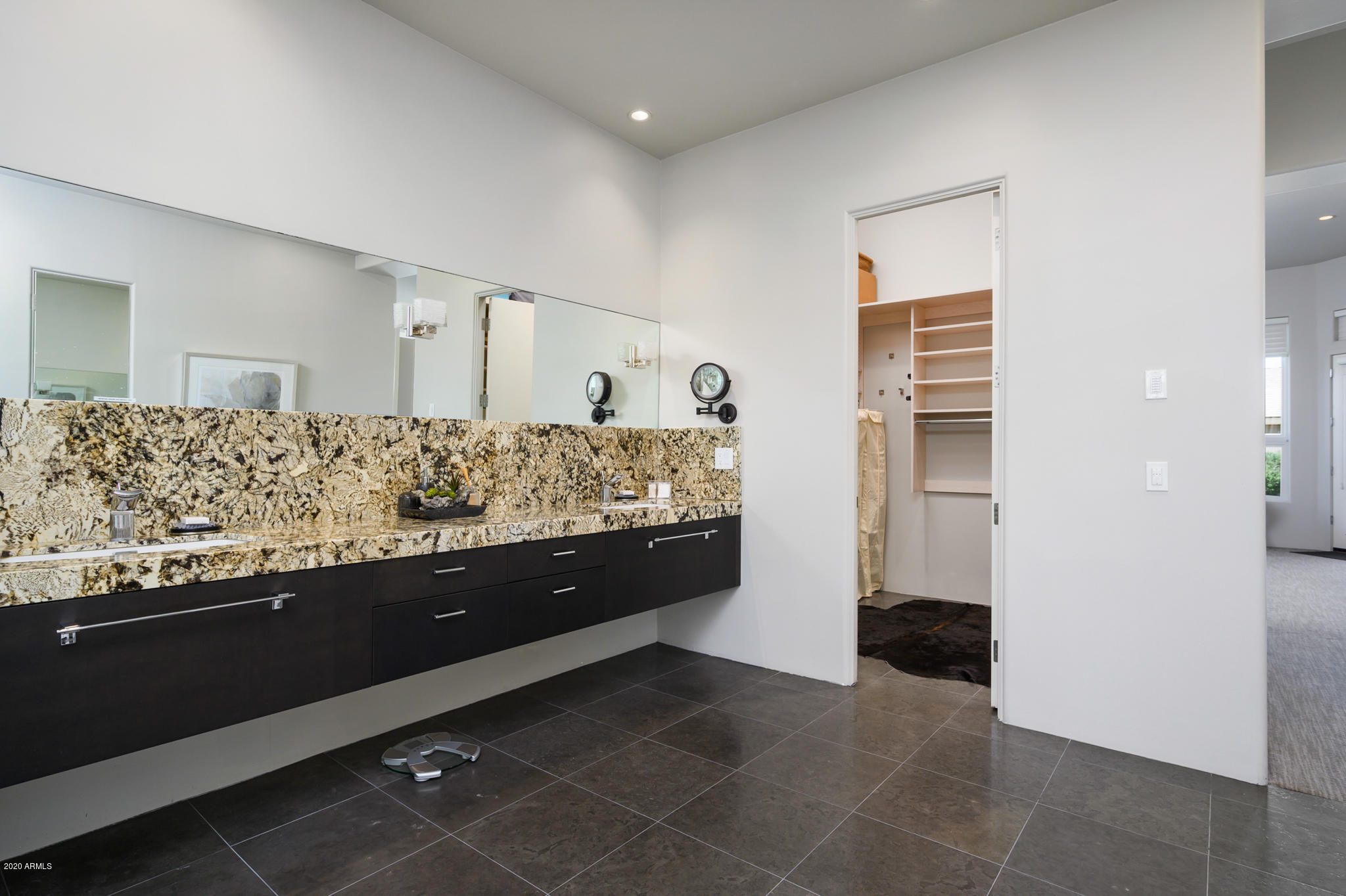7953 East Thunderhawk Road Scottsdale, AZ 85255 - Photo 23 of 40 a bathroom with a granite countertop sink and a mirror