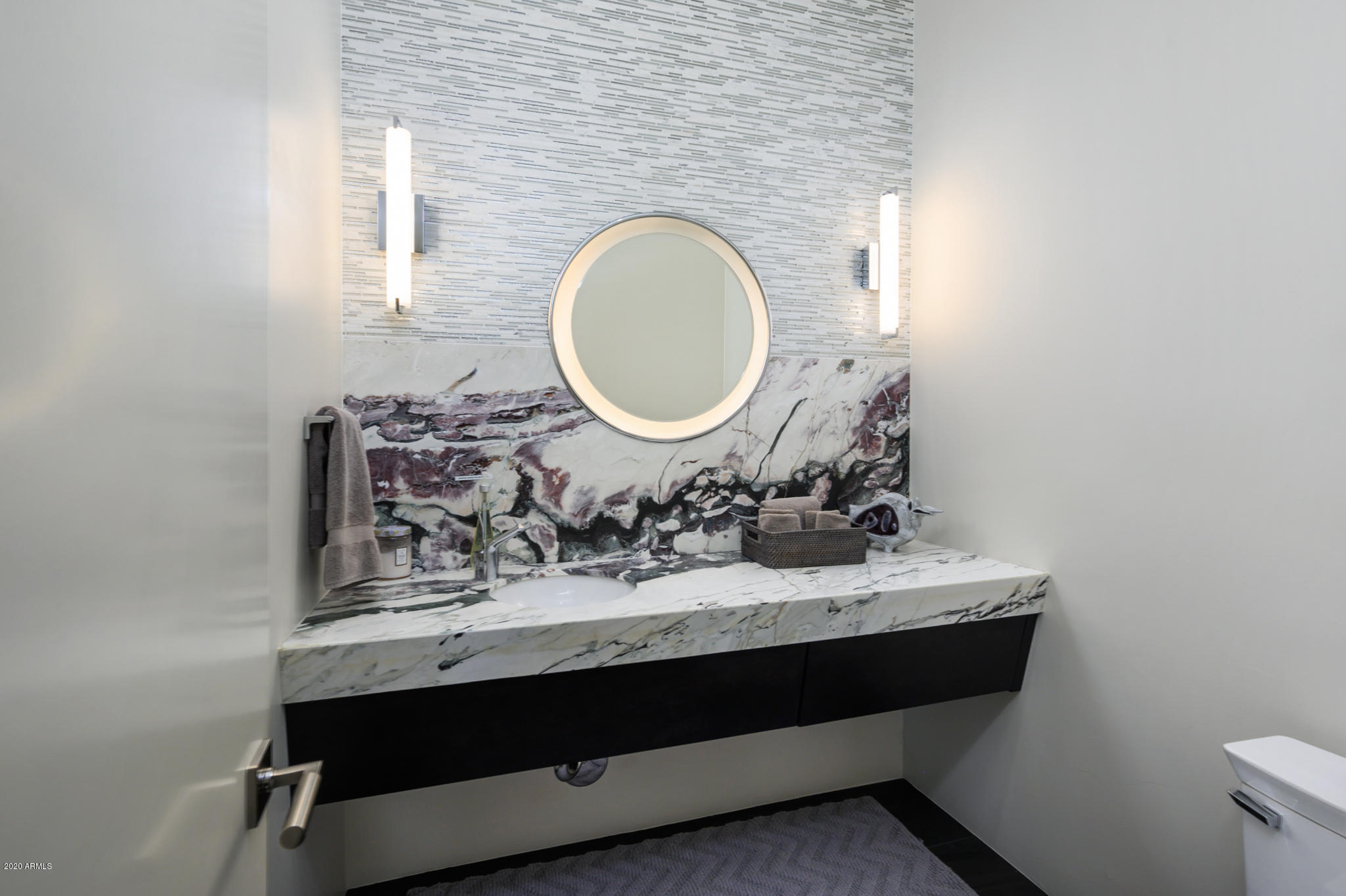 7953 East Thunderhawk Road Scottsdale, AZ 85255 - Photo 28 of 40 a bathroom with a sink and a mirror