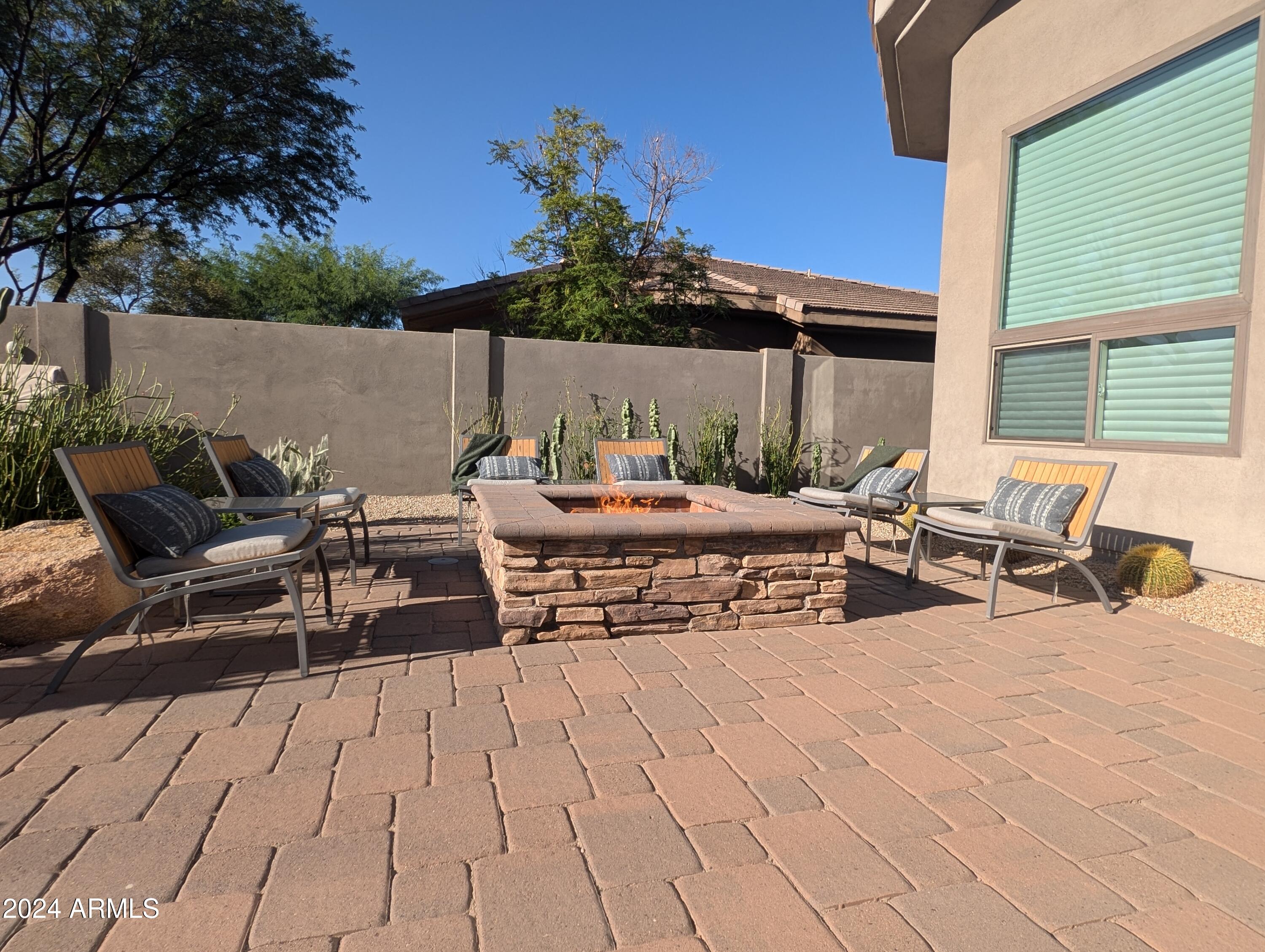 7953 East Thunderhawk Road Scottsdale, AZ 85255 - Photo 36 of 40 a outdoor space with lots of tables and chairs