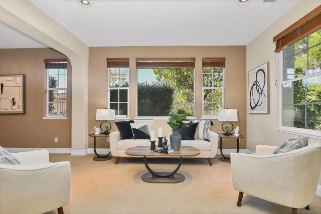 a bathroom with a sink and mirror with toilet