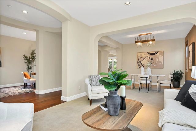 a kitchen with center island table and chairs in it