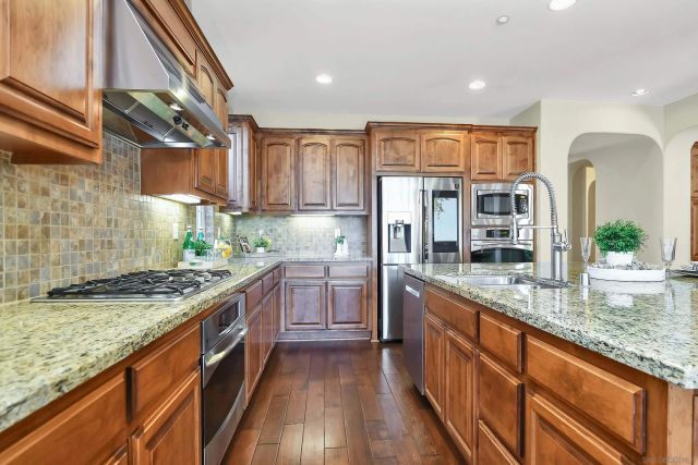 a living room with fireplace furniture and a fireplace