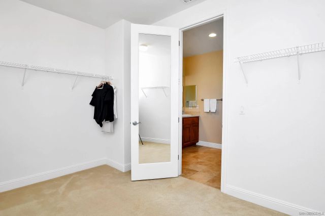 a view of a backyard with sitting area