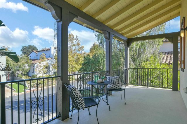 a view of a yard with large trees