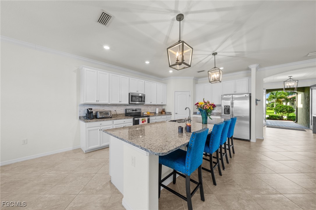 10061 Avalon Lake Circle, Unit 104 Fort Myers, FL 33913 - Photo 13 of 46 a view of a dining room and livingroom view