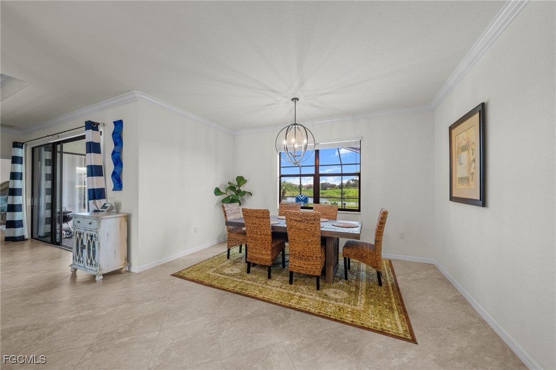 10061 Avalon Lake Circle, Unit 104 Fort Myers, FL 33913 - Photo 19 of 46 a view of a dining room with furniture