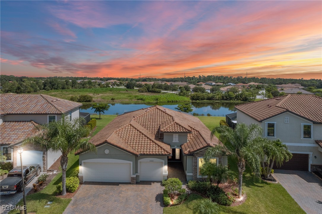 10061 Avalon Lake Circle, Unit 104 Fort Myers, FL 33913 - Photo 2 of 46 an aerial view of a house