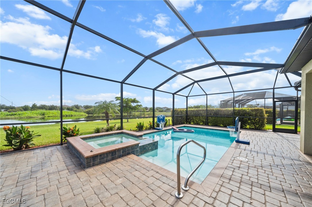 10061 Avalon Lake Circle, Unit 104 Fort Myers, FL 33913 - Photo 35 of 46 a view of swimming pool with a patio