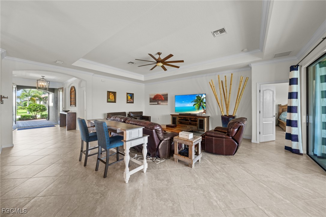 10061 Avalon Lake Circle, Unit 104 Fort Myers, FL 33913 - Photo 10 of 46 a view of a livingroom with furniture and a window