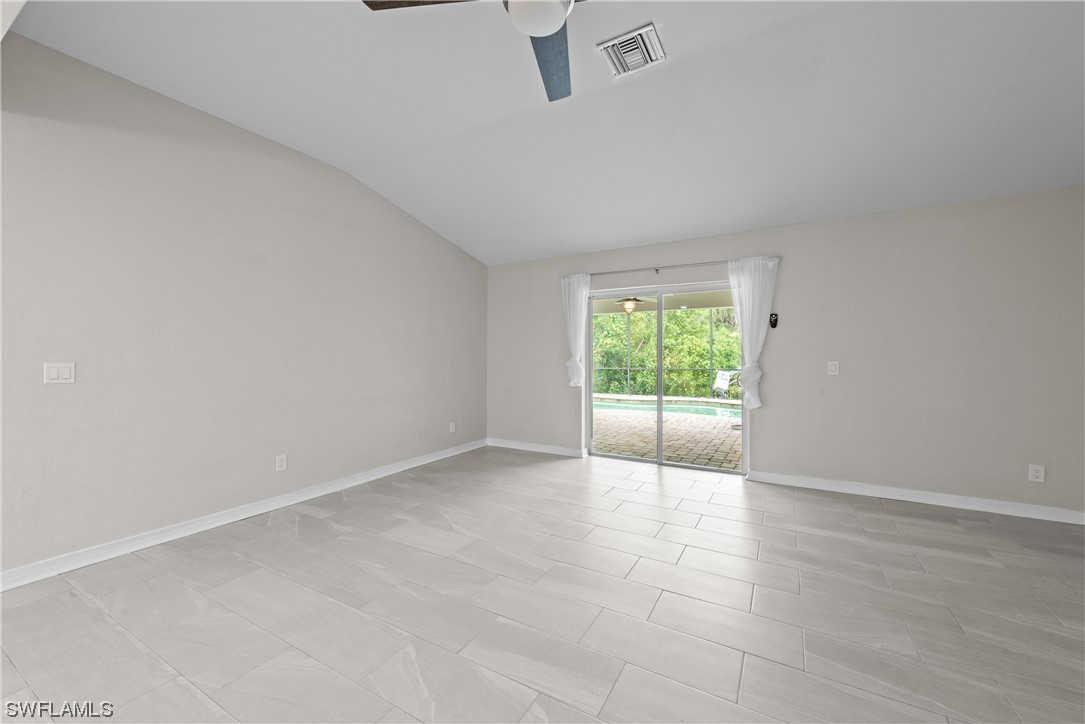 1058 Old Bridge Road North Fort Myers, FL 33917 - Photo 13 of 43 a view of an empty room with a window