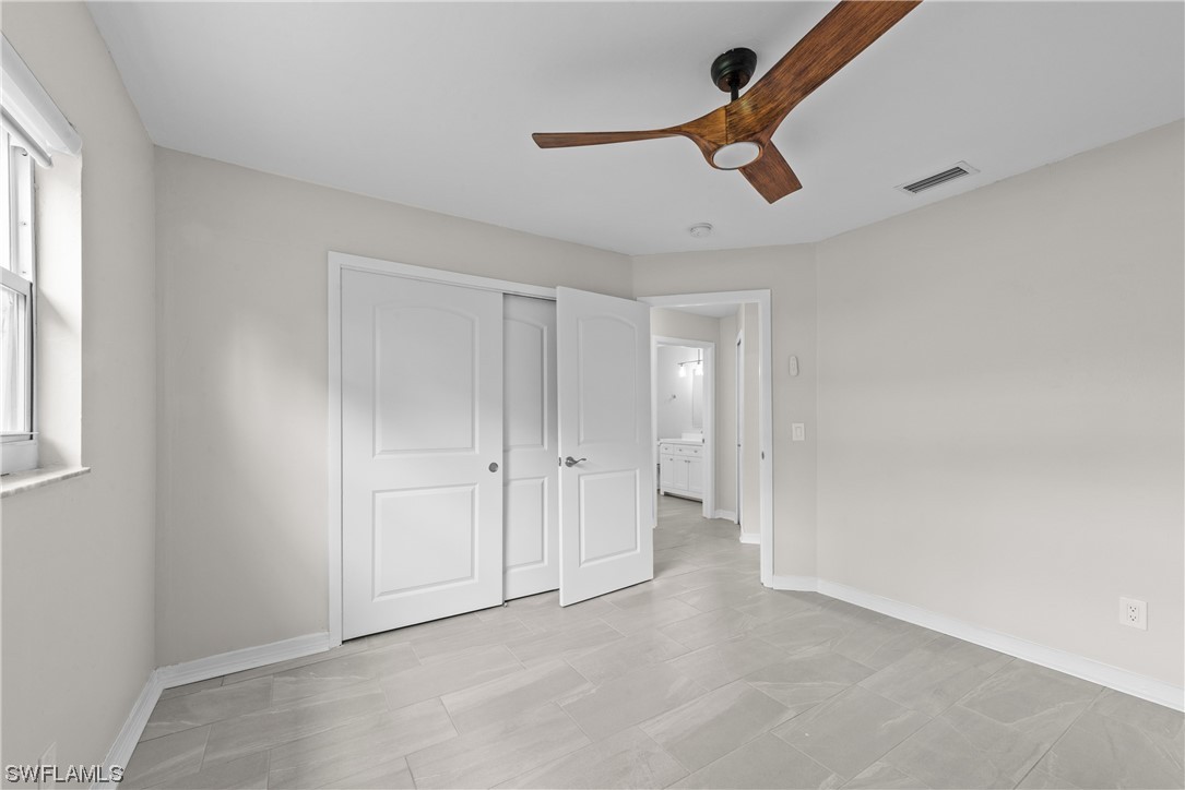 1058 Old Bridge Road North Fort Myers, FL 33917 - Photo 20 of 43 wooden floor in an empty room
