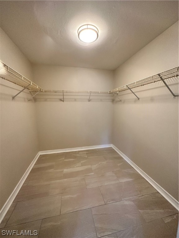 1058 Old Bridge Road North Fort Myers, FL 33917 - Photo 23 of 43 a view of a room with racks on the wall