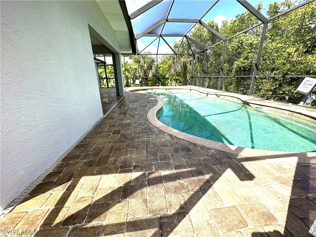 1058 Old Bridge Road North Fort Myers, FL 33917 - Photo 31 of 43 a view of yard from a balcony