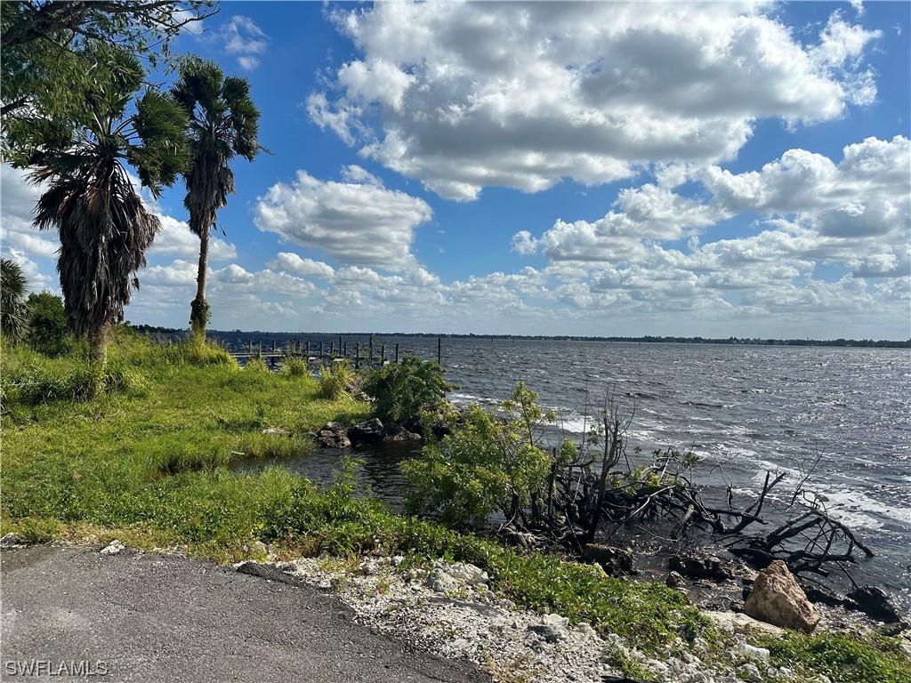 1058 Old Bridge Road North Fort Myers, FL 33917 - Photo 40 of 43 a view of a lake