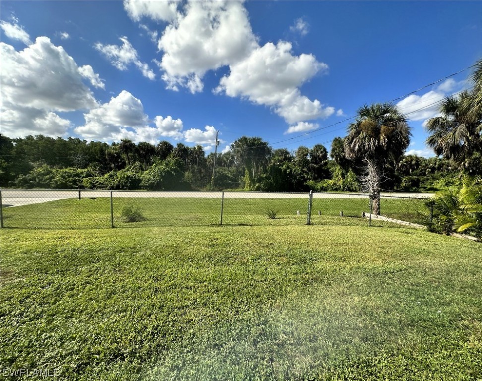 1058 Old Bridge Road North Fort Myers, FL 33917 - Photo 5 of 43 a view of a golf course with a lake