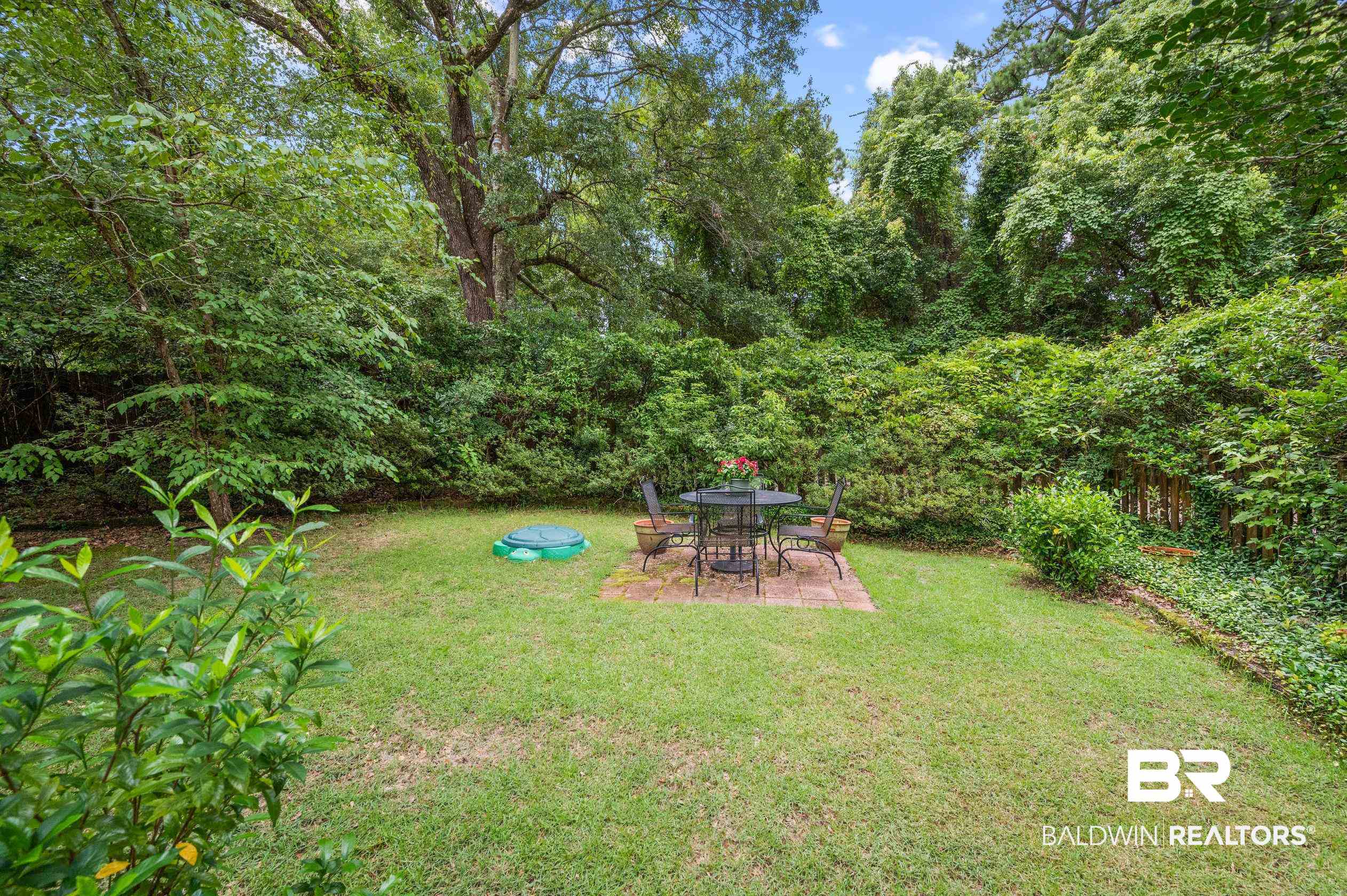6638 Jackson Square Daphne, AL 36526 - Photo 34 of 62 View of yard with a patio area and a fire pit