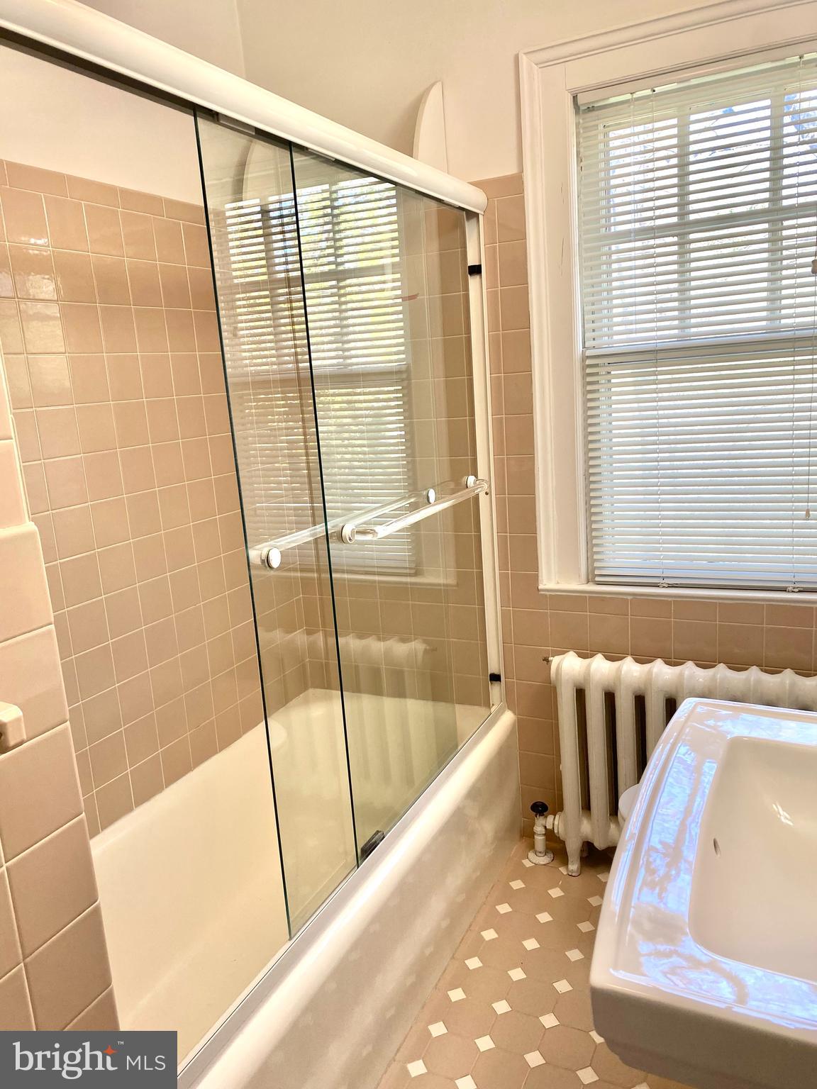 14 Snowden Road Bala Cynwyd, PA 19004 - Photo 36 of 59 Glass doors on tub, hall bath on 2nd floor