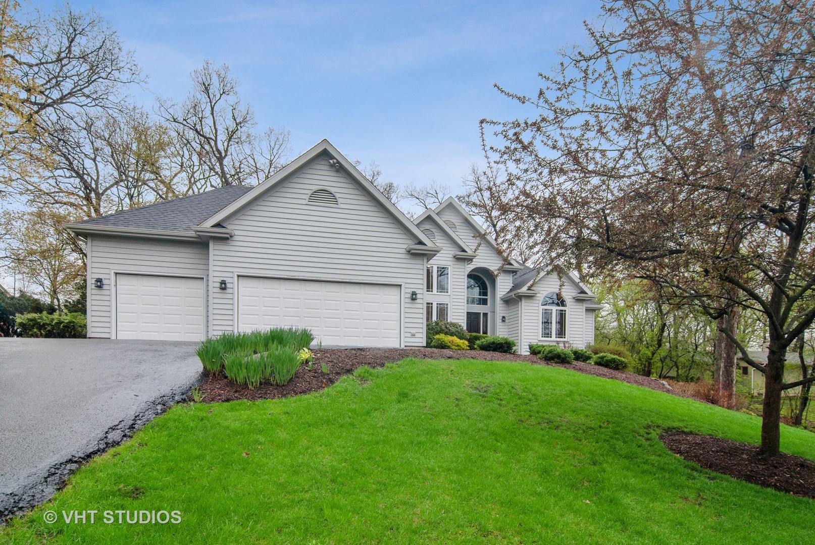 43W887 Old Midlothian Road Elburn, IL 60119 - Photo 2 of 35 a front view of house with yard and green space