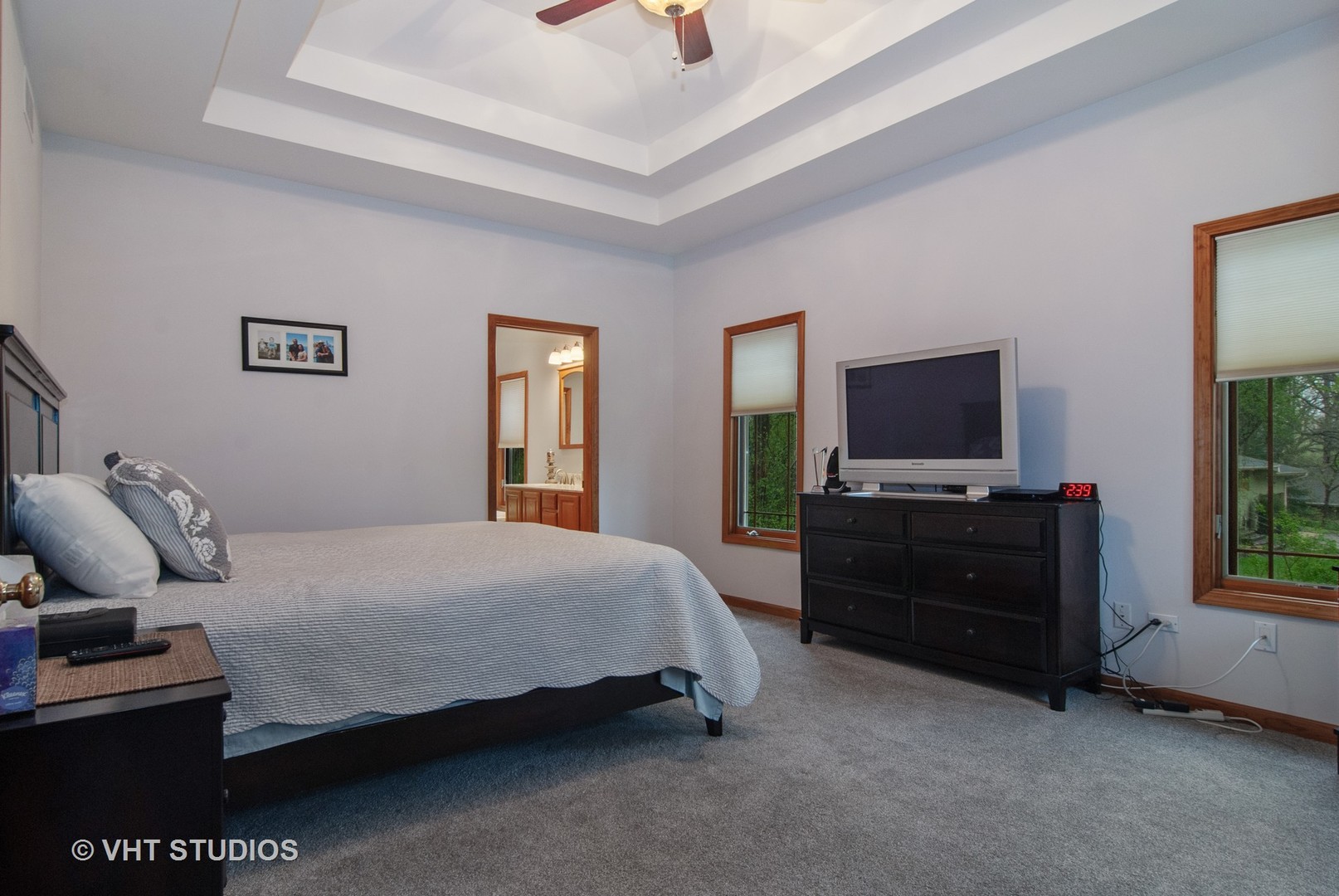 43W887 Old Midlothian Road Elburn, IL 60119 - Photo 19 of 35 a bedroom with a bed and a flat tv screen on dresser