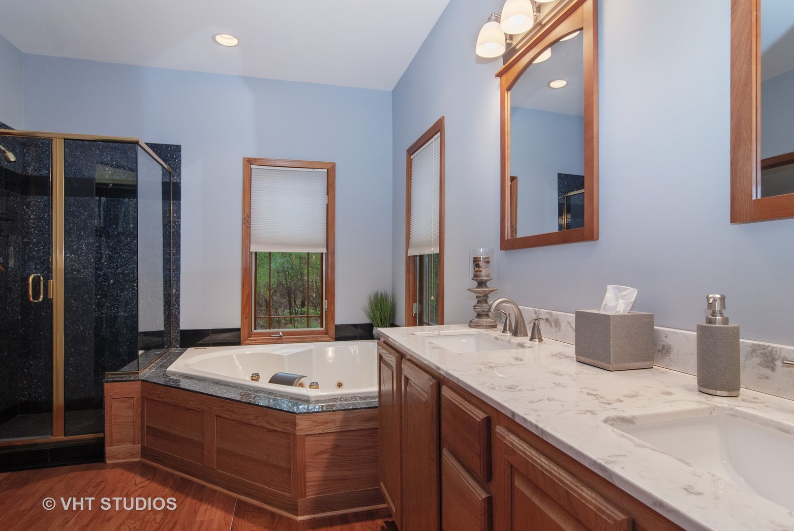 43W887 Old Midlothian Road Elburn, IL 60119 - Photo 20 of 35 a bathroom with a tub sink and mirror