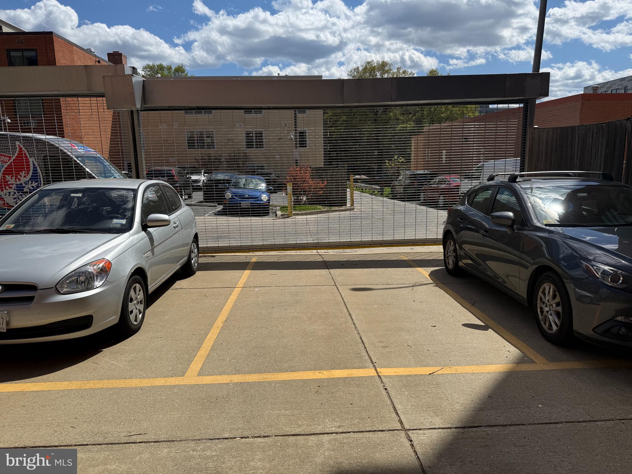 1354 Euclid Street Northwest, Unit 403A Washington, DC 20009 - Photo 23 of 26 a view of car parked on the road
