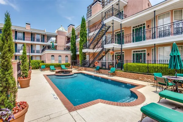 a view of pool with outdoor seating