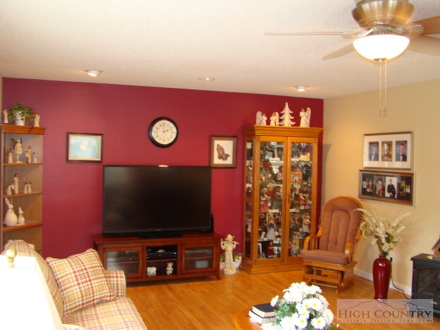 124 Alex Wellborn Road Deep Gap, NC 28618 - Photo 26 of 26 a living room with furniture and a flat screen tv