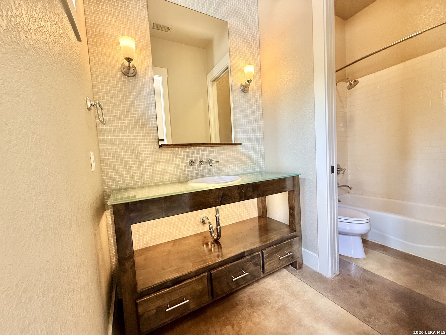 757 Copper Rim Spring Branch, TX 78070 - Photo 40 of 50 a bathroom with a sink a toilet and a bathtub