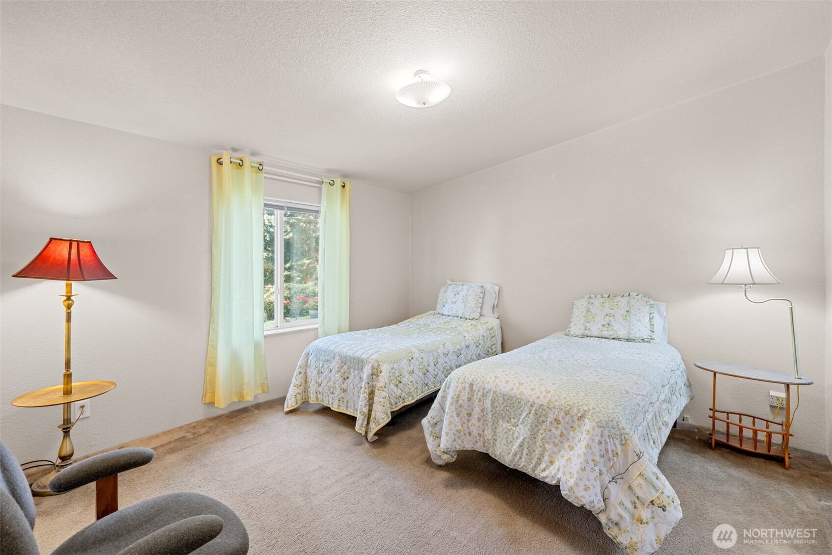 423 Fleming Drive Sequim, WA 98382 - Photo 15 of 33 a bedroom with two beds and painted walls