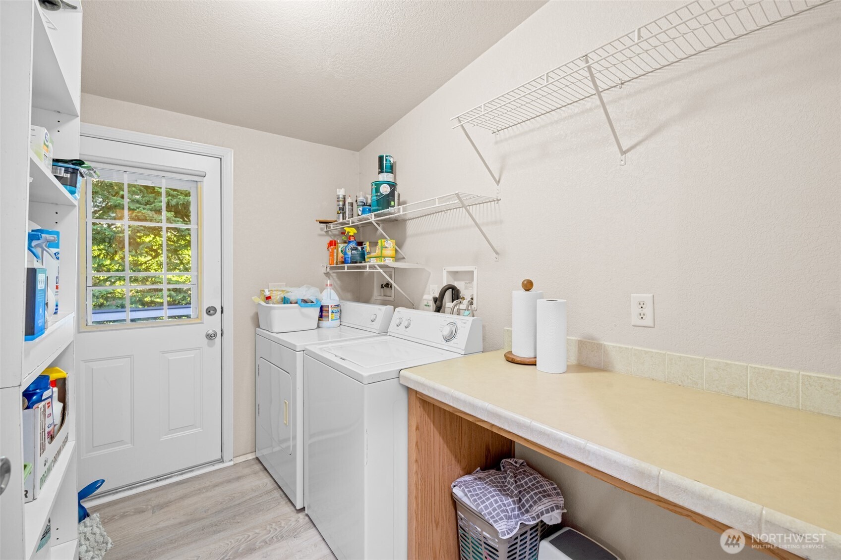 423 Fleming Drive Sequim, WA 98382 - Photo 22 of 33 a utility room with a sink a washer and dryer
