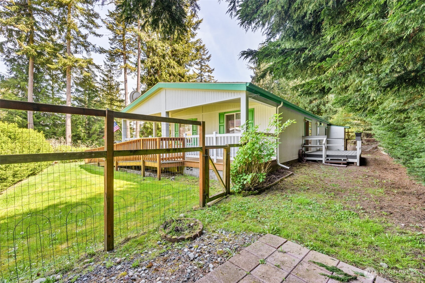 423 Fleming Drive Sequim, WA 98382 - Photo 24 of 33 a view of a house with backyard