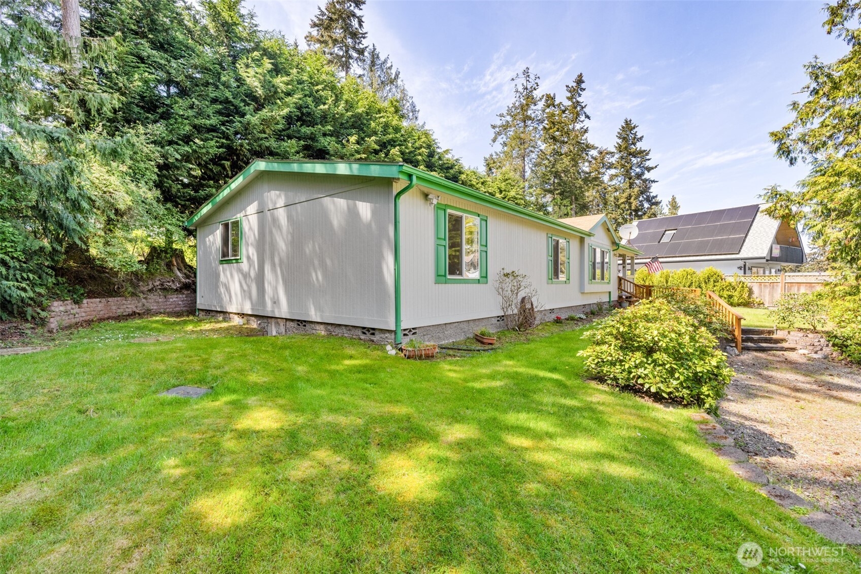 423 Fleming Drive Sequim, WA 98382 - Photo 27 of 33 a view of a back yard of the house