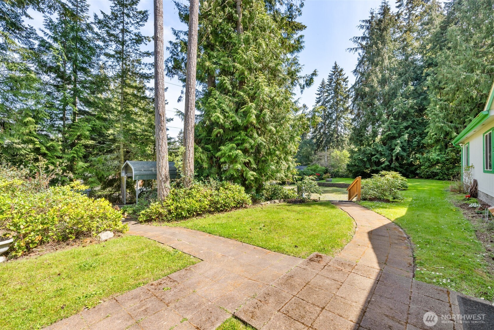 423 Fleming Drive Sequim, WA 98382 - Photo 28 of 33 a view of a swimming pool with a yard