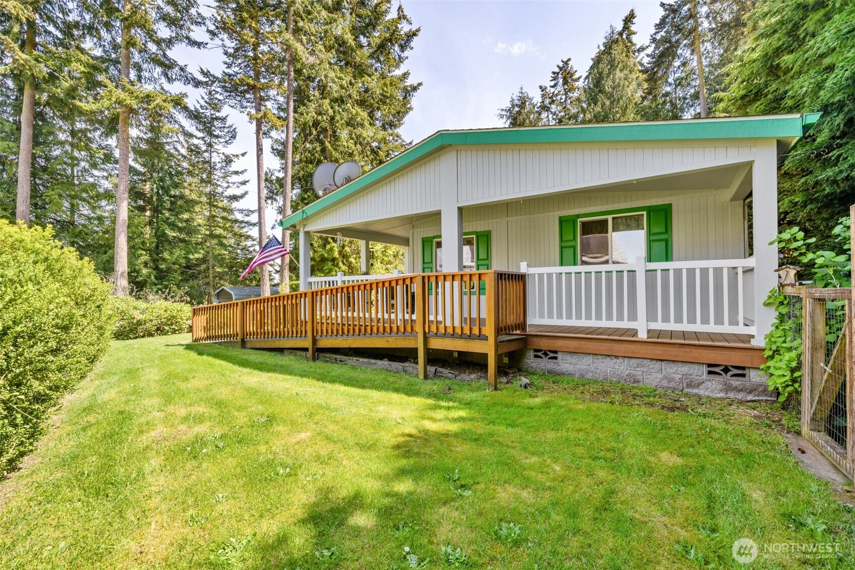 423 Fleming Drive Sequim, WA 98382 - Photo 3 of 33 a view of a house with a yard and deck