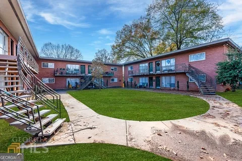 a aerial view of a house with a yard