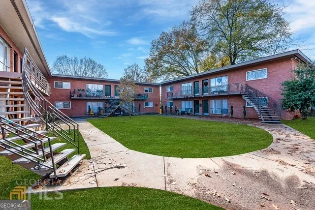 a aerial view of a house with a yard
