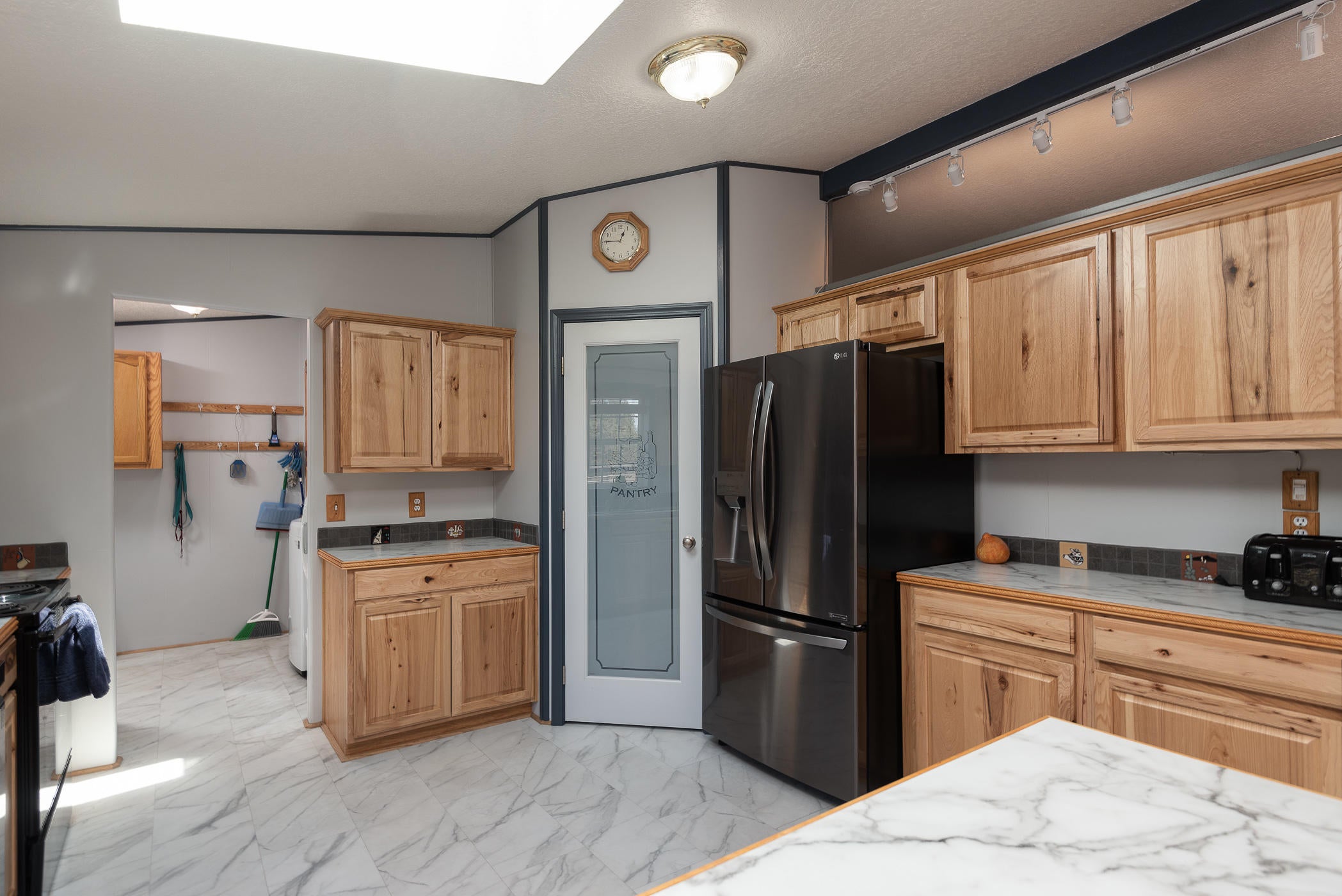 14638 Southwest Chickadee Road Terrebonne, OR 97760 - Photo 21 of 48 Kitchen to Laundry/Mud Room