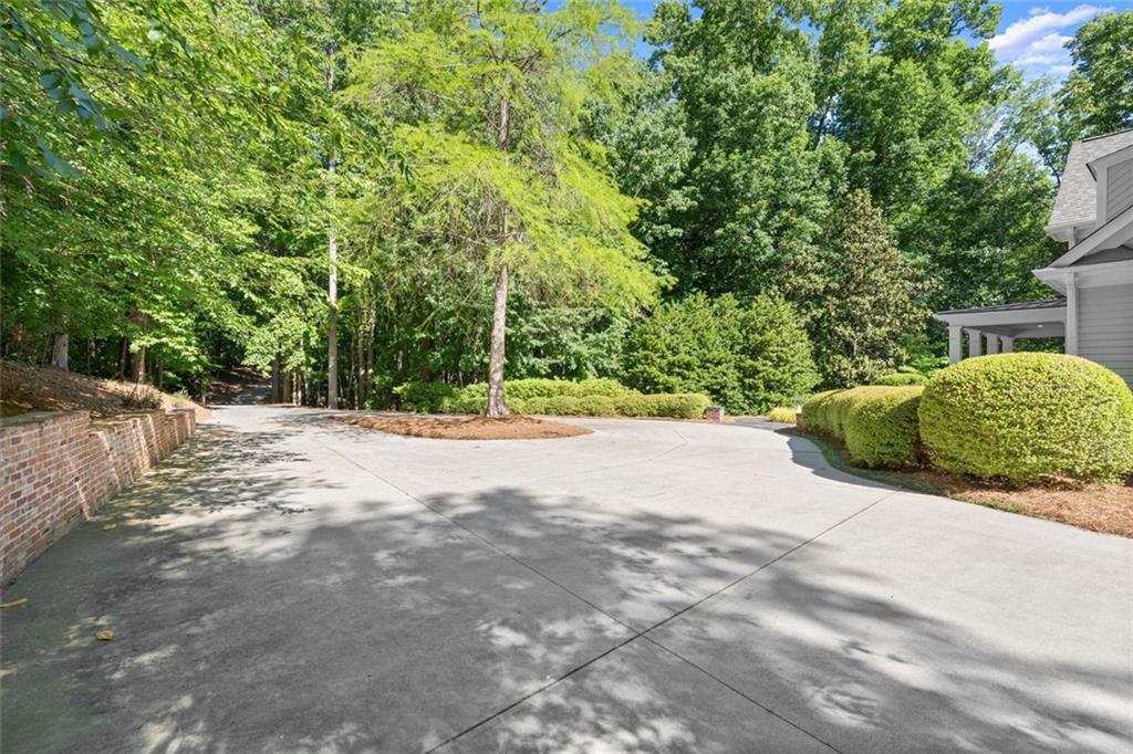 1450 Acworth Due West Road Northwest Kennesaw, GA 30152 - Photo 73 of 77 a view of backyard and a trees