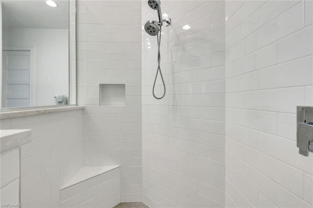 8825 Yucatan Court Naples, FL 34113 - Photo 20 of 45 a bathroom with a shower