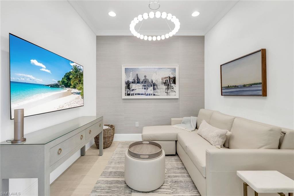8825 Yucatan Court Naples, FL 34113 - Photo 22 of 45 a living room with furniture and a large window