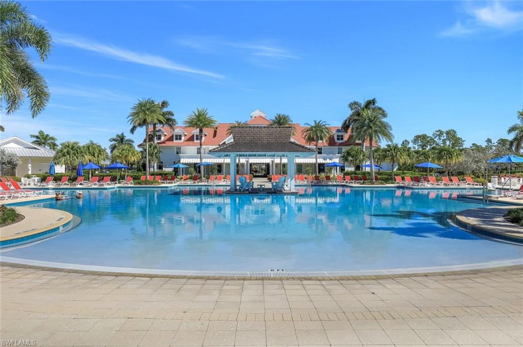 8825 Yucatan Court Naples, FL 34113 - Photo 40 of 45 a view of swimming pool with outdoor seating
