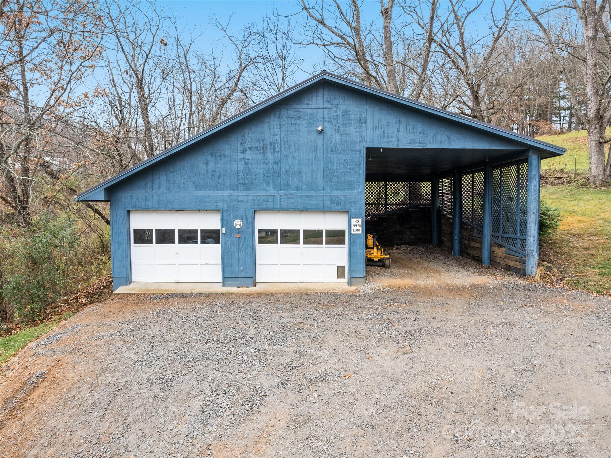 148 Mingus Cove Road Canton, NC 28716 - Photo 29 of 34 a house with trees in the background