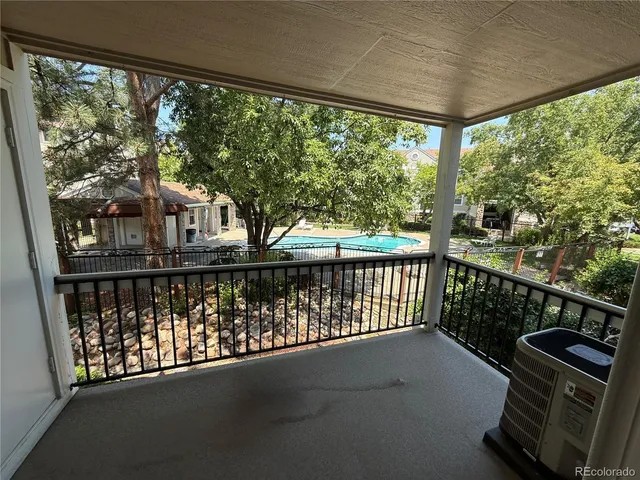 a view of a balcony with city from a balcony