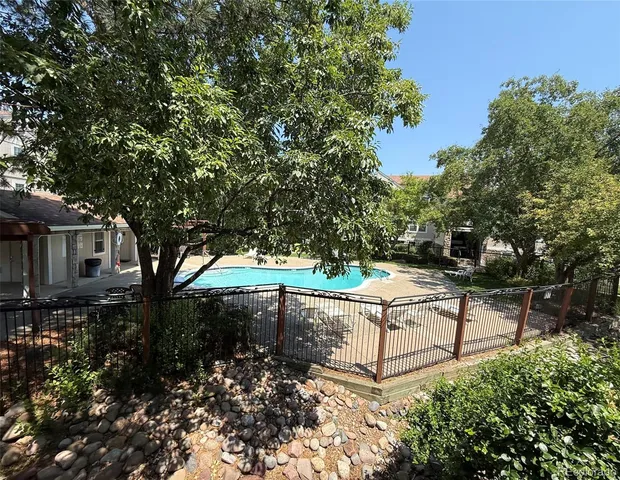 a view of a bench in a garden