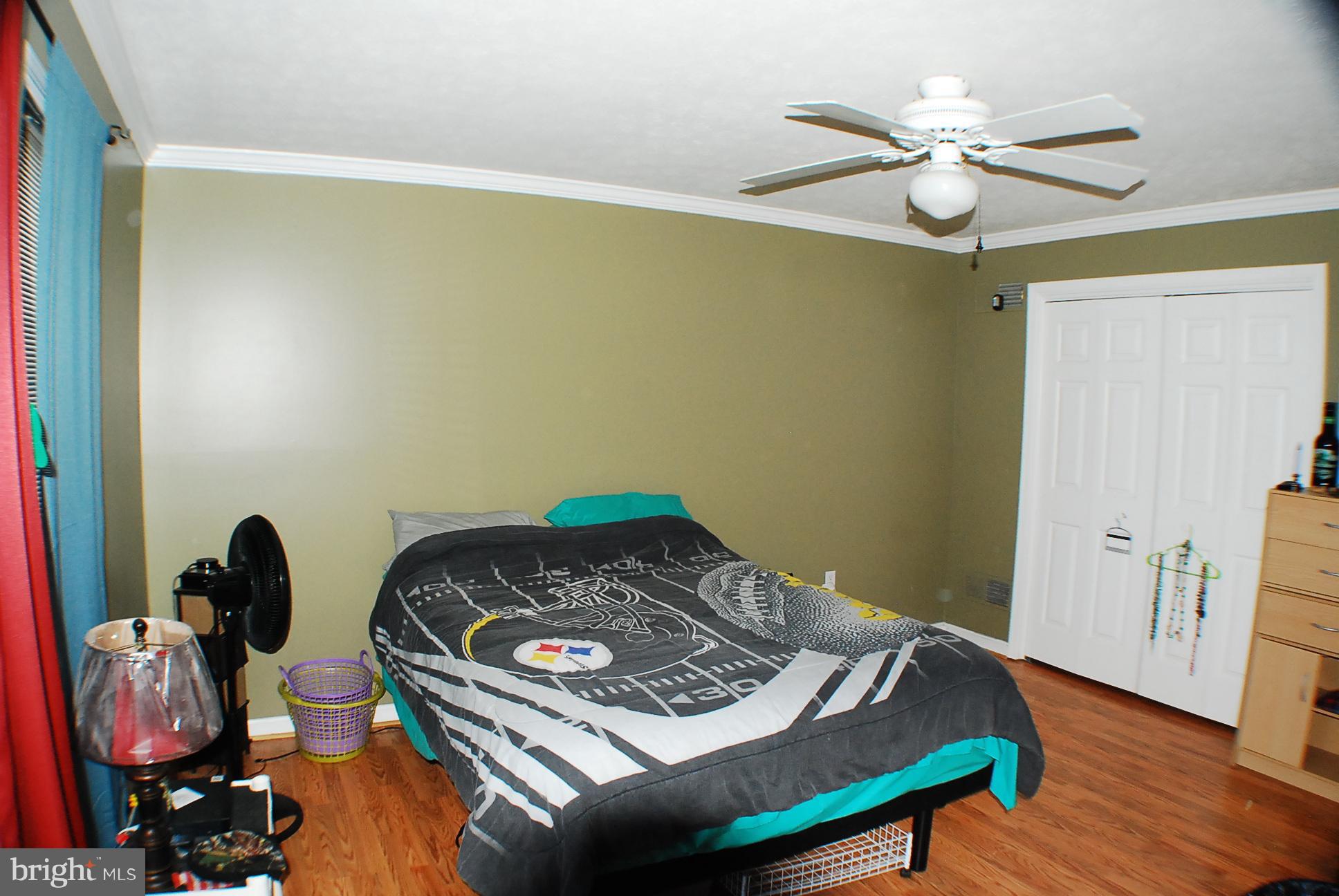 350 Redland Road Cross Junction, VA 22625 - Photo 14 of 30 a living room with furniture and a chandelier
