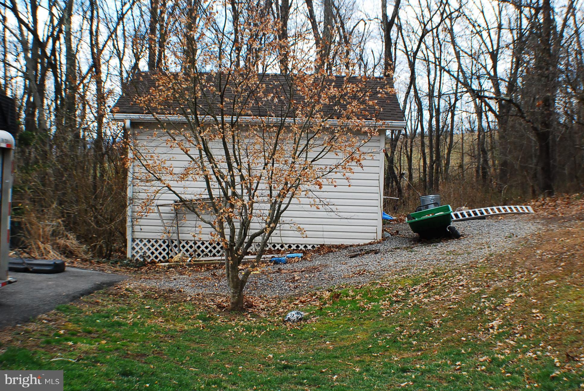 350 Redland Road Cross Junction, VA 22625 - Photo 25 of 30 a view of a house with a yard