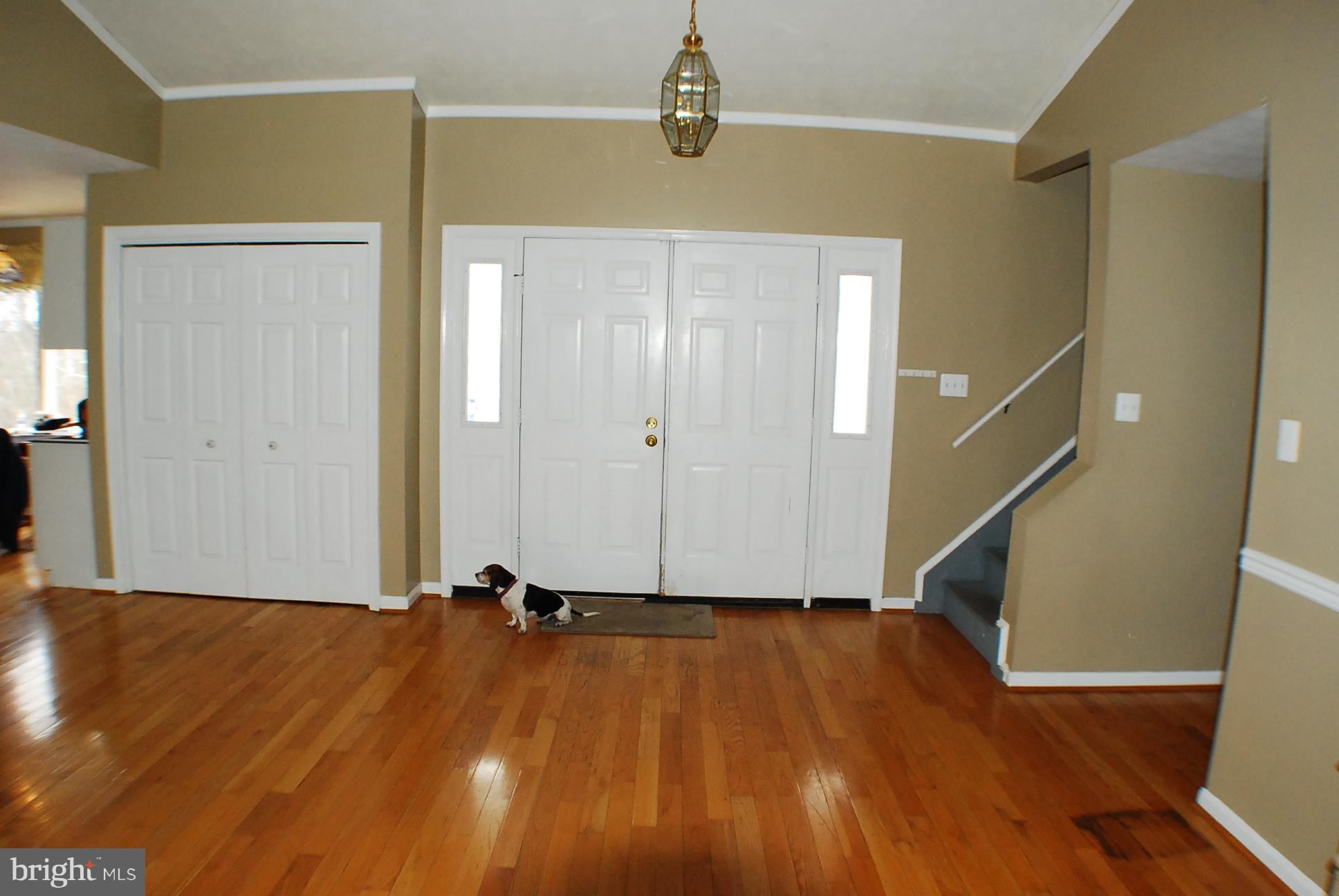 350 Redland Road Cross Junction, VA 22625 - Photo 6 of 30 a view of an empty room with wooden floor and stairs