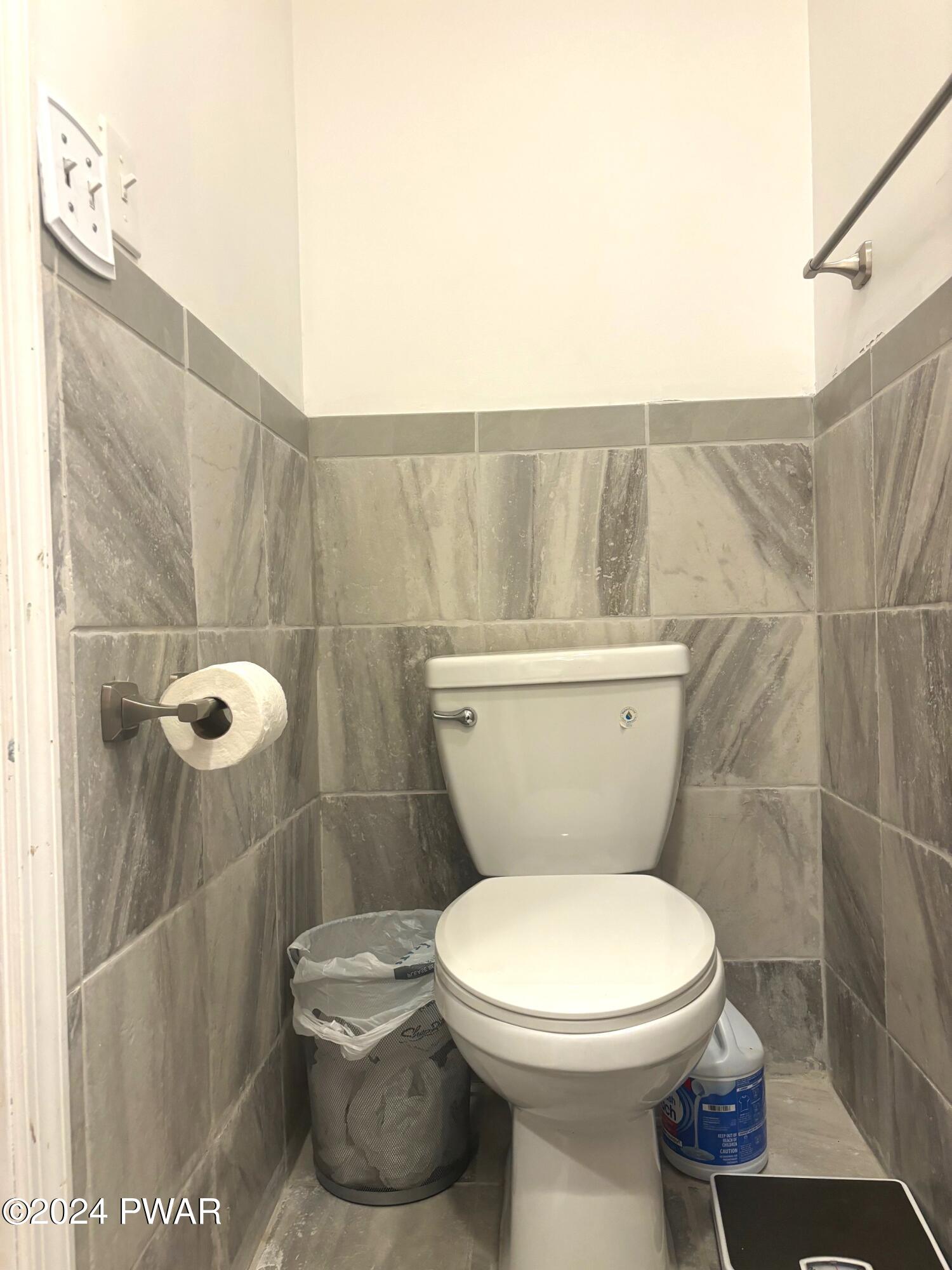 1113 Bracts Road Effort, PA 18330 - Photo 21 of 27 a white toilet sitting next to a bathroom sink