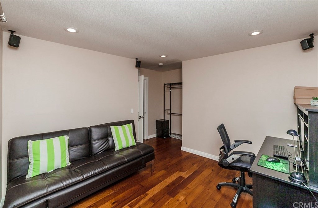 8 Hawthorn Irvine, CA 92612 - Photo 17 of 27 a view of a workspace with furniture and wooden floor
