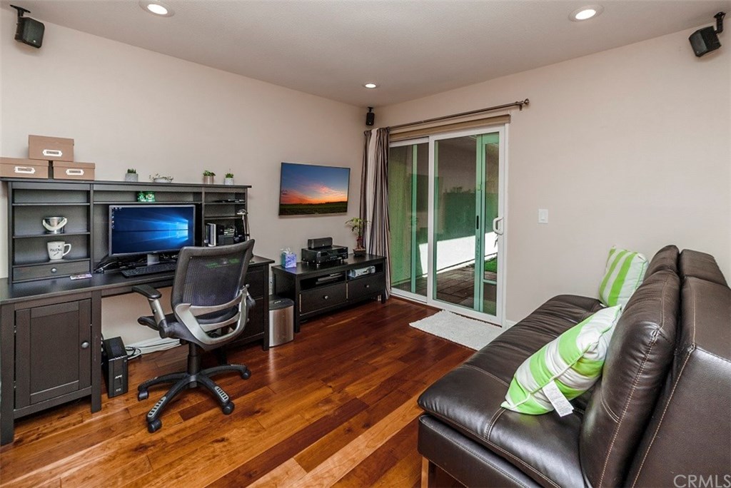 8 Hawthorn Irvine, CA 92612 - Photo 18 of 27 a work room with furniture rug and a window